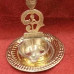 Om Velaku with Plate